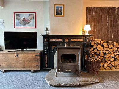 Living room with television: French, Dutch, English and German channels