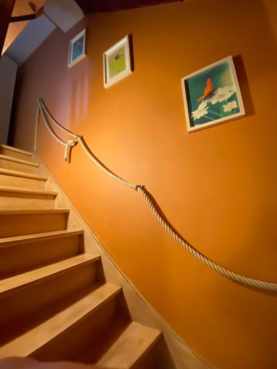 Staircase leading up to the bedrooms, connected to bedroom 2