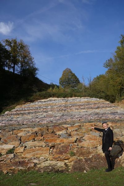 The 'geological wall' — an artist built this wall with stones of different ages. The region is known for its many stone quarries.