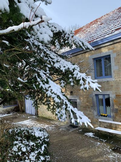 The cottage under the snow — beautiful in winter too!